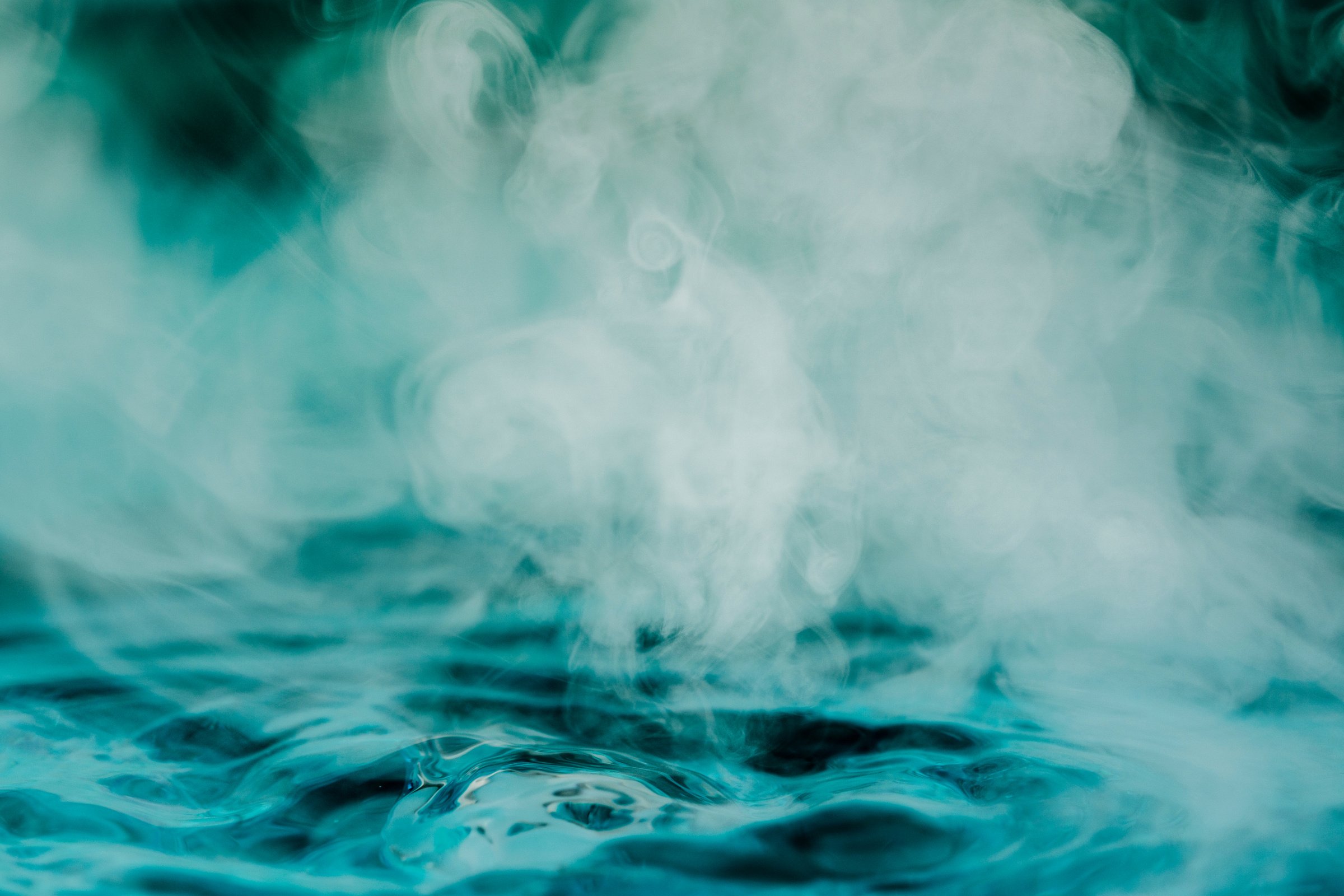 teal blue abstract background with steam and water